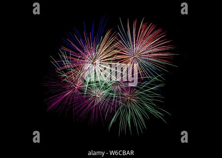 Holiday fireworks on black sky. Stock Photo