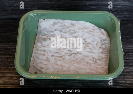 Empty packet of vegan mince with paper lining and recycled and recyclable plastic tray. Manufacturers being responsible and consumers shopping wisely. Stock Photo