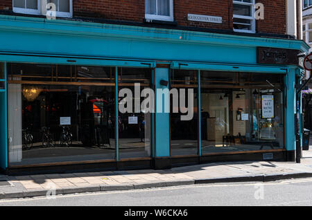 Oxford, United Kingdom - June 29 2019:   The abandoned frontage of a closed down Jamies Italian restaurant in Red Lion Square Stock Photo