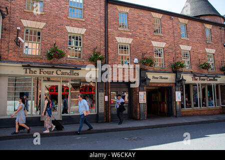 Oxford, United Kingdom - June 29 2019:   The frontage of the Four Candles pub in George Street Stock Photo