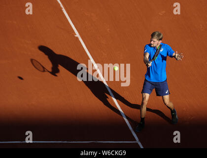 Belgian  tennis player David Goffin playing backhand shot in French Open 2019 tournament, Paris, France Stock Photo