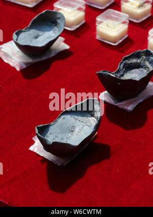 Silver ingots unearthed from the sunken boats owned by peasant leader Zhang Xianzhong (Chang Hsien-chung) of the late Ming dynasty (1368-1644) at the Stock Photo