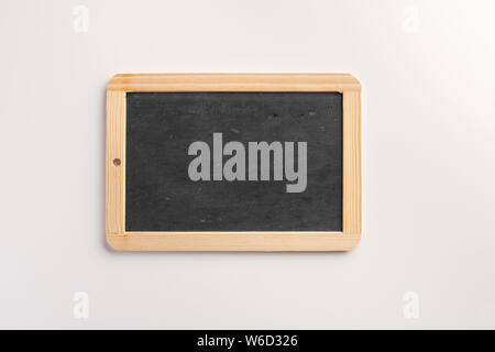 Empty chalkboard isolated on white background. Flat lay. Stock Photo