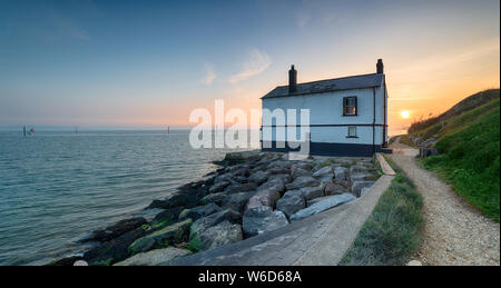 A house on the beach at Lepe in the New Forest National Park in Hampshire Stock Photo