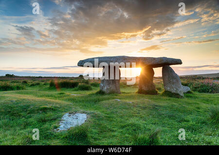 Stunning sunset over Lanyon Quoit near the village of Madron just outside Penzance in Cornwall Stock Photo