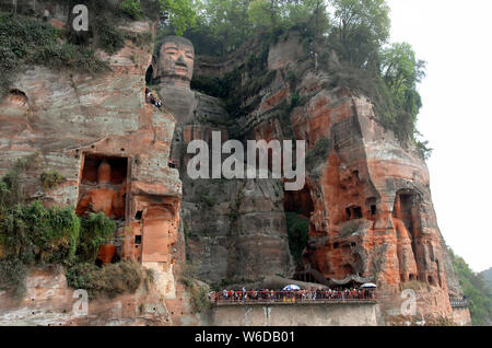 The Leshan Giant Buddha or Leshan Grand Buddha near Chengdu. This is the tallest stone Buddha statue in the world. Leshan Buddha, Sichuan. UNESCO Stock Photo