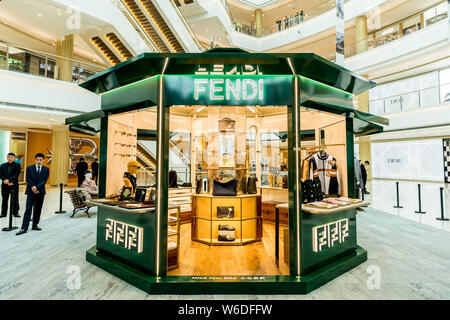View of a pop-up bookshop-shaped Fendi concept boutique at a