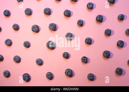 Blueberry pattern on pink background top view Stock Photo