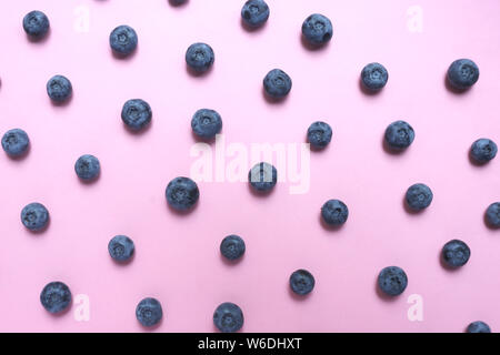 Blueberry pattern on pink background top view Stock Photo