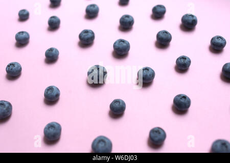 Blueberry pattern on pink background top view Stock Photo