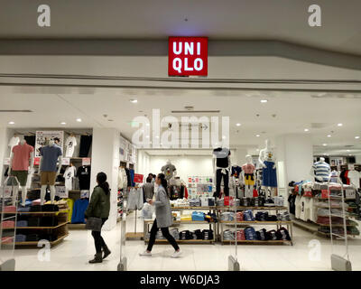 View of anime and manga-themed t-shirts in commemoration with the 50th anniversary of Weekly Shonen Jump for sale at a Uniqlo store in Shanghai, China Stock Photo