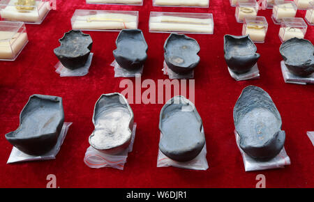 Silver ingots unearthed from the sunken boats owned by peasant leader Zhang Xianzhong (Chang Hsien-chung) of the late Ming dynasty (1368-1644) at the Stock Photo