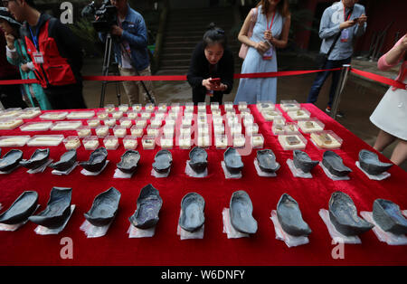 Silver ingots unearthed from the sunken boats owned by peasant leader Zhang Xianzhong (Chang Hsien-chung) of the late Ming dynasty (1368-1644) at the Stock Photo