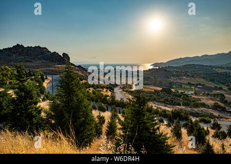 Landscape view of the northern coast of the island of Lesvos, Greece as the sun begins to descend Stock Photo