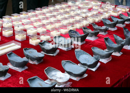 Silver ingots unearthed from the sunken boats owned by peasant leader Zhang Xianzhong (Chang Hsien-chung) of the late Ming dynasty (1368-1644) at the Stock Photo