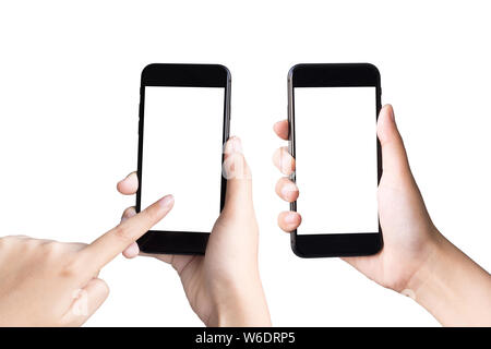 two hands holding and playing smart phones on white background with clipping path Stock Photo