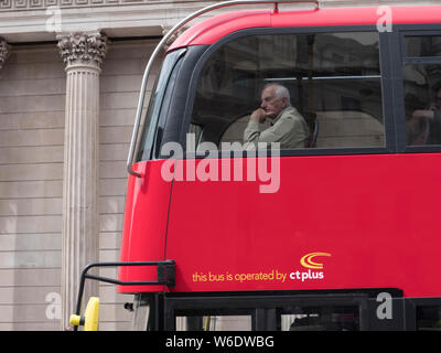 ctplus London Red  double decker bus with passengers, CT Plus is the main operations arm of transport social enterprise HCT Group Stock Photo