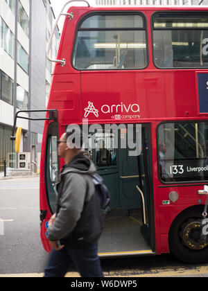 Arriva London Red  double decker bus with passengers, Arriva Group Arriva UK Bus is part of the Arriva group, which is owned by Deutsche Bahn. Stock Photo