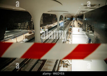 Berlin, Germany. 01st Aug, 2019. A warning tape secures a construction site for the future underground line U5 at the U5 info station in front of the Red Town Hall. Credit: Carsten Koall/dpa/Alamy Live News Stock Photo