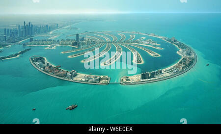 An aerial view of the Palm Jumeirah artificial island which resembles a stylized palm tree in Dubai, United Arab Emirates, 6 April 2018. Dubai, the la Stock Photo