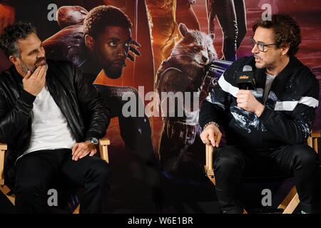 American actor and singer Robert Downey Jr., right, and American actor and filmmaker Mark Ruffalo attend a press conference for new movie 'Avengers: I
