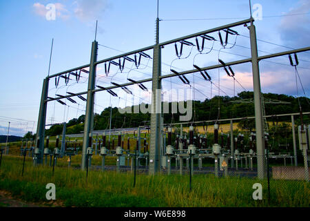 Power transformer in high voltage switchyard in modern electrical substation Stock Photo