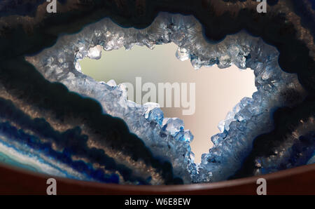 agate gem with hole in the middle close up texture background Stock Photo