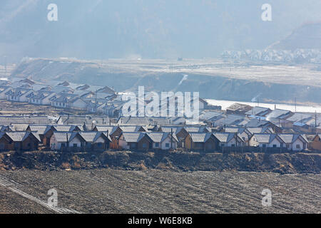 Thousands of villas built for employees who labored at the Hyesan mine, one of the largest silver mines, are lined up in Ryanggang province, North Kor Stock Photo