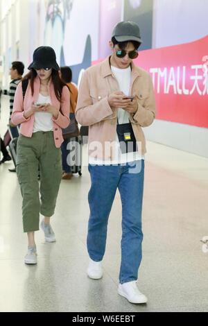 Chinese actress Ni Ni, left, and her boyfriend actor Jing Boran are ...