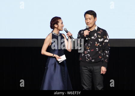 Hong Kong singer and actor Leon Lai Ming, right, attends the launch ceremony of the 14th Entertainment Expo in Hong Kong, China, 19 March 2018. Stock Photo