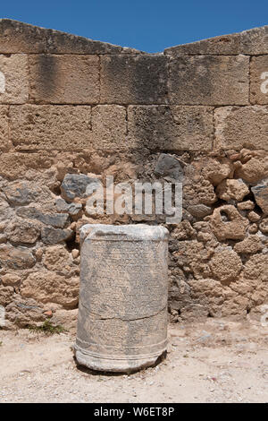 Greece, Rhodes, Historic Lindos, medieval Acropolis of Lindos. Detail of carved stone with written text.9 Stock Photo