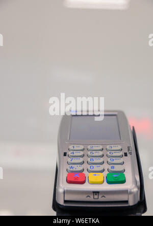 Credit card terminal. Close up of payment device, card machine. Stock Photo
