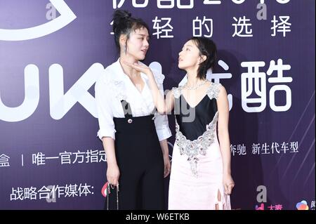 Chinese actress Zhou Dongyu, left, and South Korean actor Lee Joon-gi  attend a press conference to promote their new movie Never Said Goodbye  in Bei Stock Photo - Alamy