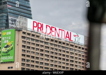 --FILE--View of an advertisement of British insurer Prudential in Shanghai, China, 4 December 2017.   British insurer Prudential plans to spin off its Stock Photo