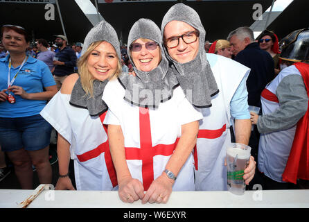 England fans dressed as knights pose for a photo during day one of the Ashes Test match at Edgbaston, Birmingham. Stock Photo