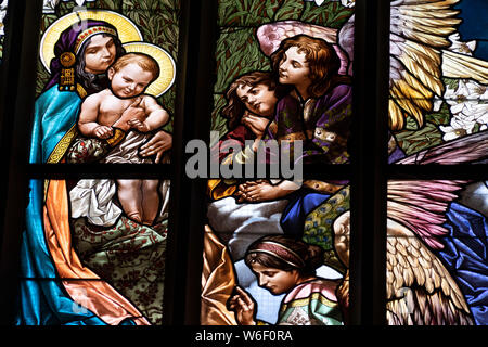 window glass mucha liberty style of kutna hora dome saint barbara church czech republic Stock Photo