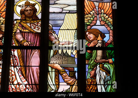 window glass mucha liberty style of kutna hora dome saint barbara church czech republic Stock Photo