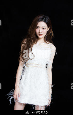 Chinese actress Xu Lu poses for portrait photos during an exclusive interview by Imaginechina in Beijing, China, 17 December 2017.   Dress: Nicole+Fel Stock Photo