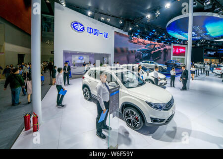 --FILE--People visit the stand of FAW during the 15th China (Guangzhou) International Automobile Exhibition, also known as Auto Guangzhou 2017, in Gua Stock Photo