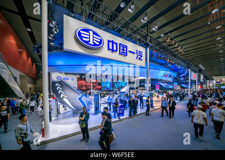 --FILE--People visit the stand of FAW during the 15th China (Guangzhou) International Automobile Exhibition, also known as Auto Guangzhou 2017, in Gua Stock Photo