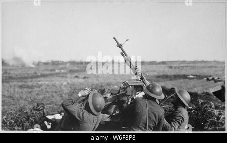 Anti-aircraft machine gun of 101st Field Artillery (formerly 1st Massachusetts Field Artillery, New England Coast Artillery), firing on a German observation plane at Plateau Chemin des Dames, France., 03/05/1918; General notes:  Use War and Conflict Number 622 when ordering a reproduction or requesting information about this image. Stock Photo