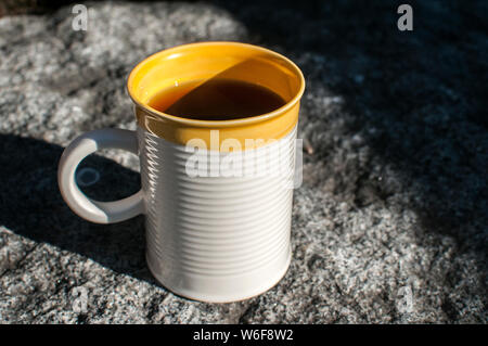 Ceramic tea mug closeup on stone surface closeup Stock Photo