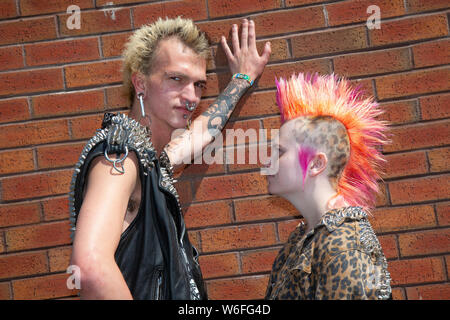 Blackpool, Lancashire, UK. 1st August,  2019. Beth Webster from Surrey & Saige Trammelle from the USA at the Rebellion Festival world's largest punk festival in Blackpool. At the beginning of August, Blackpool’s Winter Gardens plays host to a massive line up of punk bands for the 21st edition of Rebellion Festival attracting thousands of tourists to the resort.  Over 4 days every August in Blackpool, the very best in Punk gather for this social event of the year with 4 days of music across 6 stages with masses of bands. Credit; MediaWorldImages/Ģ����ý Live News Stock Photo