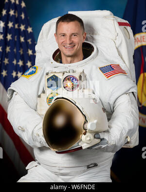 International Space Station Expedition astronaut Andrew Morgan NASA poses for his official portrait wearing a U.S. spacesuit, also known as an Extravehicular Mobility Unit at the Johnson Space Center April 30, 2019 in Houston, Texas. Stock Photo