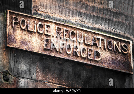 'Police Regulations Enforced' street sign on the side of a building on Rose Street, Edinburgh, Scotland. 04 May 2013 Stock Photo