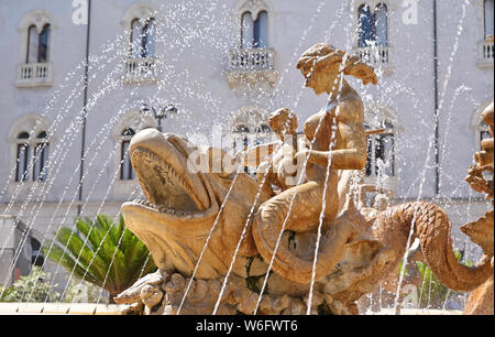 Built by Giulio Moschetti in 1907,  classic fountain on Piazza Archimede, Ortigia Sicily  features a statue of the goddess Diana. Stock Photo