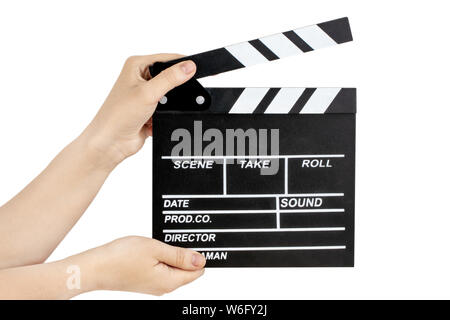 Hands holding clapper board  isolated on white with clipping path. Stock Photo