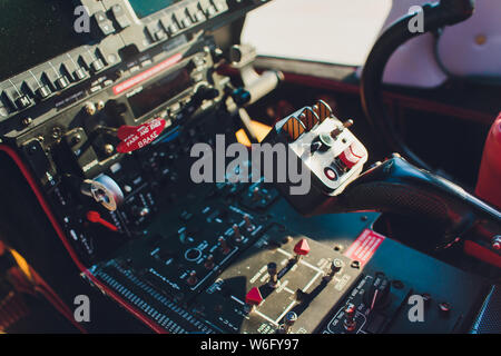 Black control panel in a helicopter cockpit. Stock Photo