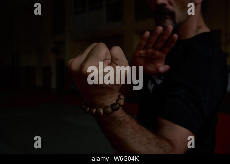 Close-up of hand of martial artist for a fight. Concept. Strong arms Stock Photo