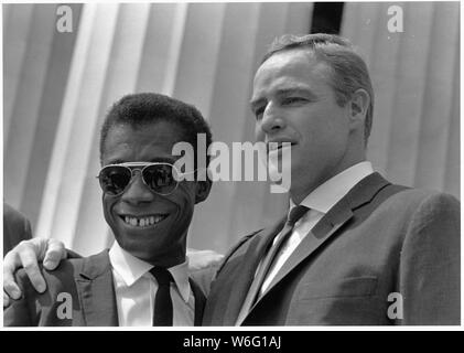 Civil Rights March on Washington, D.C.[Author James Baldwin and actor Marlon Brando.] Stock Photo